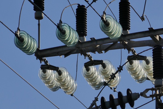 Electrical transformer in a power distribution system for voltage regulation