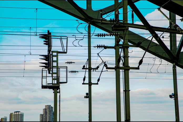 Main components of a power distribution system including panels, transformers, and meters